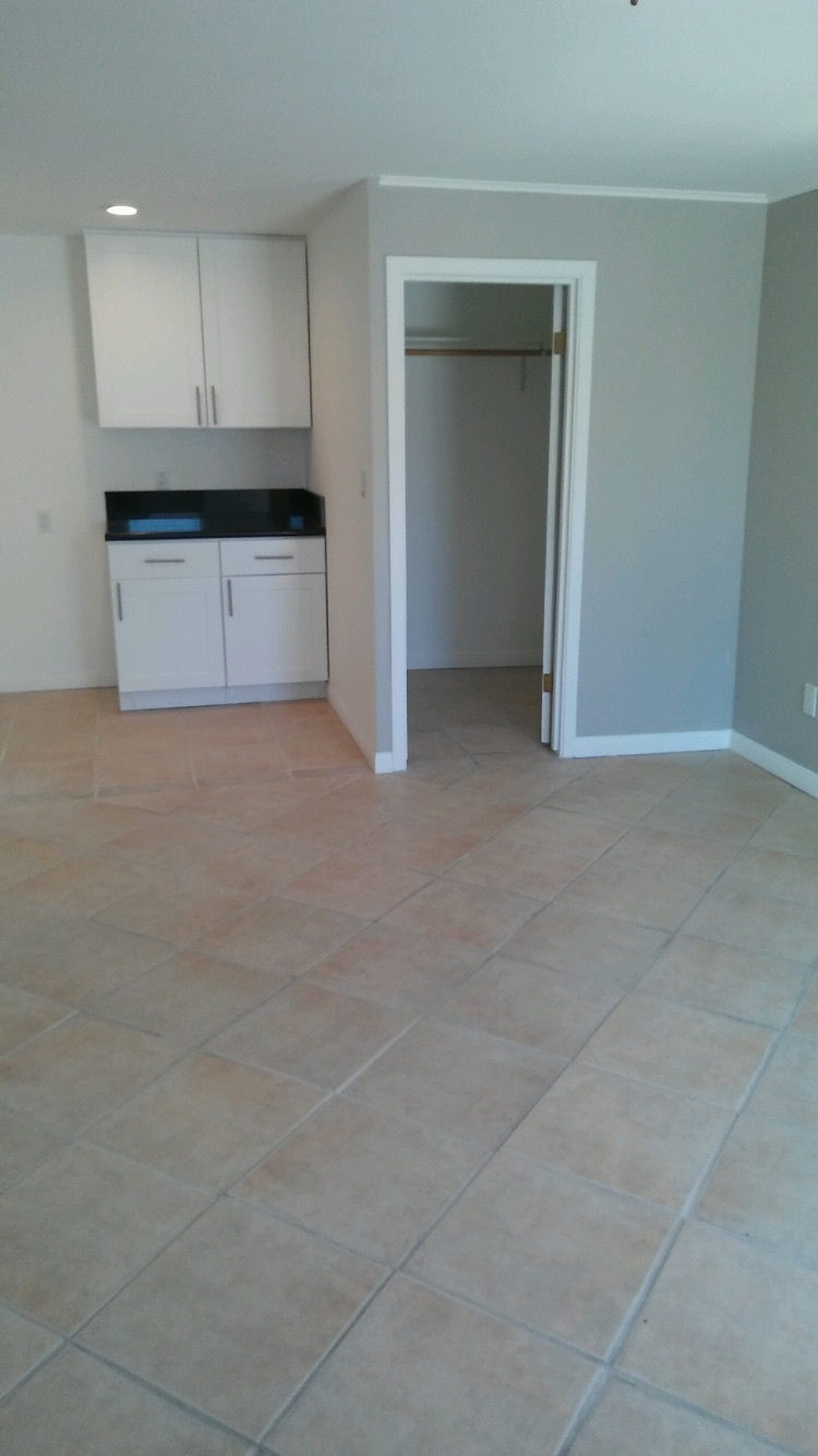 Walk in closet and countertop with cabinet space - 12623 Beverly Blvd