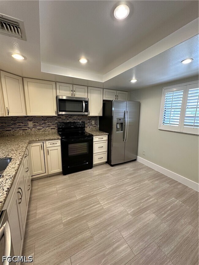 Building Photo - 6136 Whiskey Creek Dr