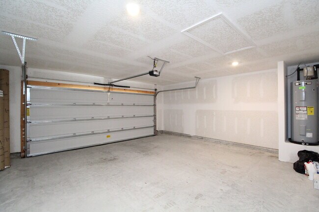 Building Photo - Coming Available Soon – 4BR/2BA Brick Home with Open Floor Plan, Solar Panels & 2-Car Garage in L...