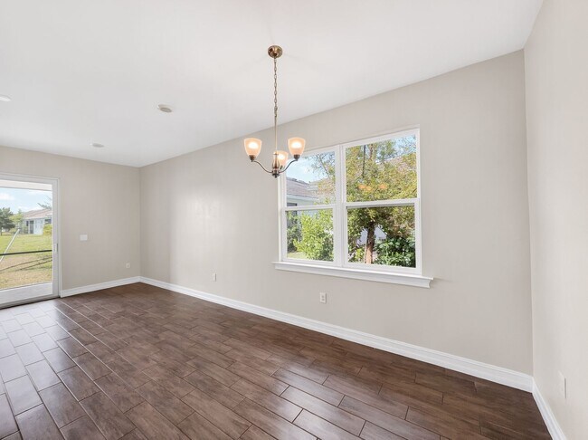 Building Photo - Live the Southwest Florida lifestyle in this lakefront villa in South Naples!
