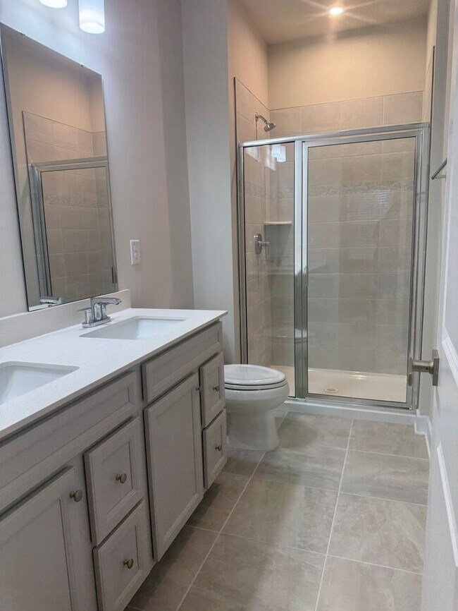 Building Photo - Brand New 3-Story Townhome with 2-Car Gara...