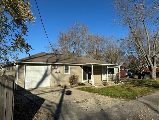 Concrete Driveway & Covered Porch - 3900 W 11th St