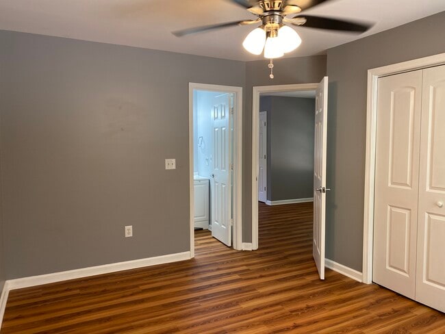 Downstairs bedroom with view of bathroom - 1305 Cedar Shoals Drive #500