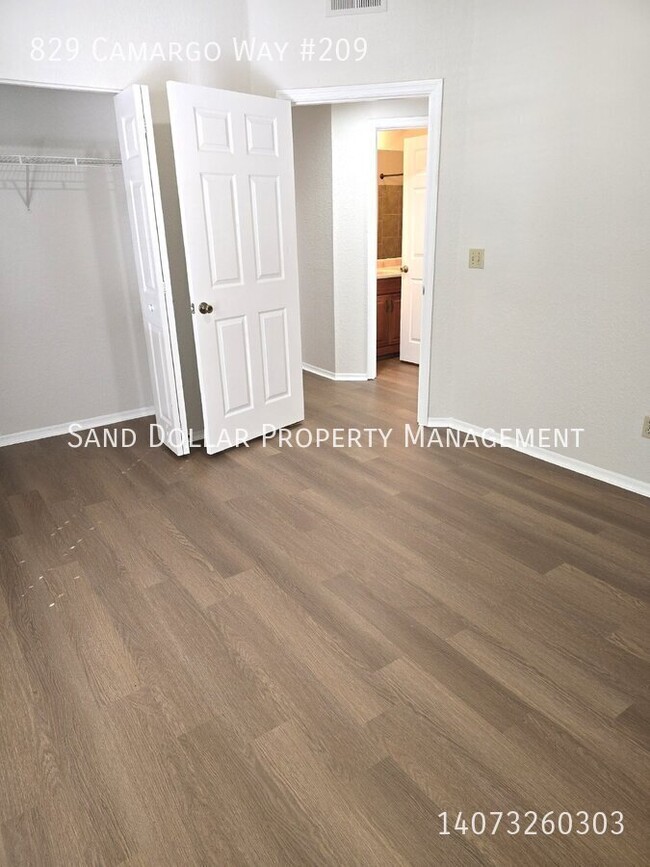 Building Photo - Wonderfully renovated 2nd floor condo in a...