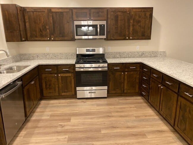 Building Photo - Brand New 4 Bedroom Charming home