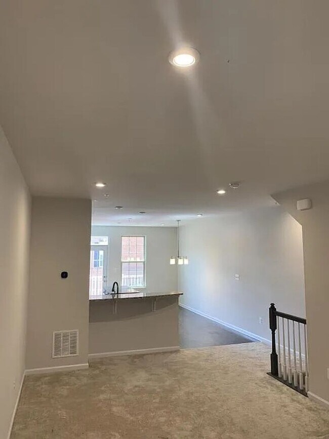 Building Photo - Modern 2BR + Office Townhome with Garage &...