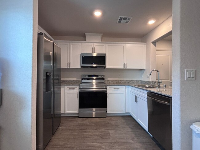 Building Photo - Modern 2024 Townhome in Gated Community with Resort-Style Amenities