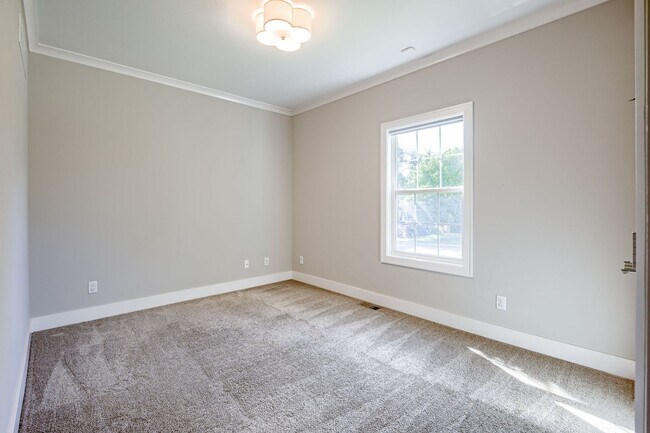 Building Photo - {4620} James Engle Custom Home built in 2019 + Main Floor Primary Bedroom + Finished Basement wit...