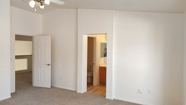 Building Photo - Townhome with Loft + Two Bedrooms/Baths - Designed for Comfort in Gated Community