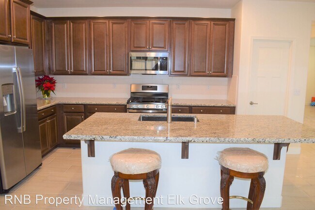 Building Photo - 4 br, 3 bath House - 9303 Chiffonade Way