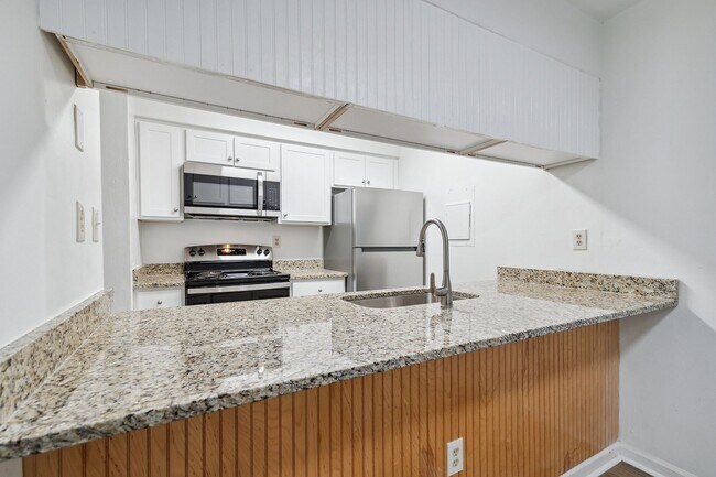 Building Photo - Location, Community, Quality Living. It St...
