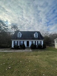 Building Photo - Cape Cod Style 3 bed, 2 bath, 2 car garage...