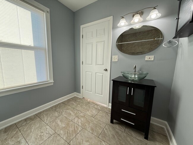 Building Photo - 9738 S Ave L