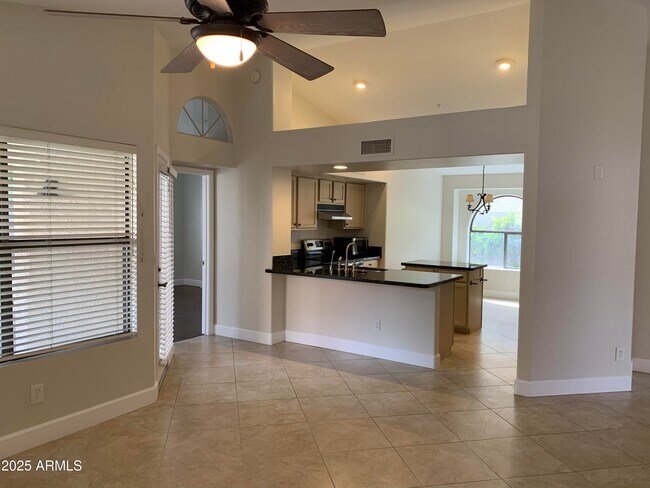Building Photo - 8889 E Aster Dr