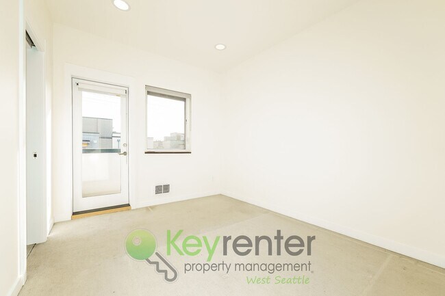 Building Photo - **Rent Special** Modern Two Bedroom Townhome with Designated Parking