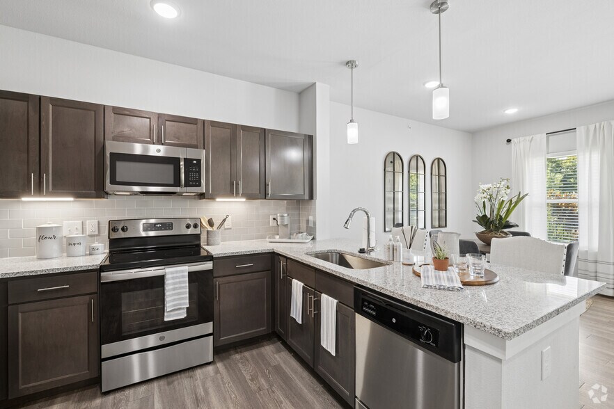 1BR, 1BA - 811SF - Kitchen - Sage Highland Creek 55+ Active Adult