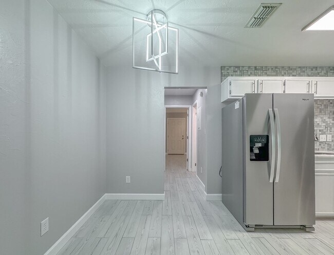 Building Photo - MODERN! Walk to FSU 2/2 w/ Marble Counters, Stainless Steel Appliances, & Privacy Fenced Yard! Av...