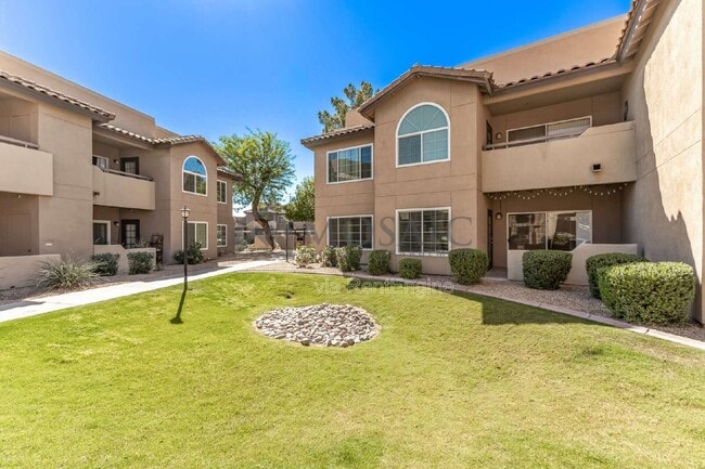 Building Photo - 9451 E Becker Ln