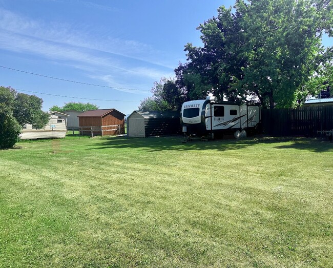 Building Photo - Charming 3 Bedroom Home in Quiet, Tree Lined Neighborhood