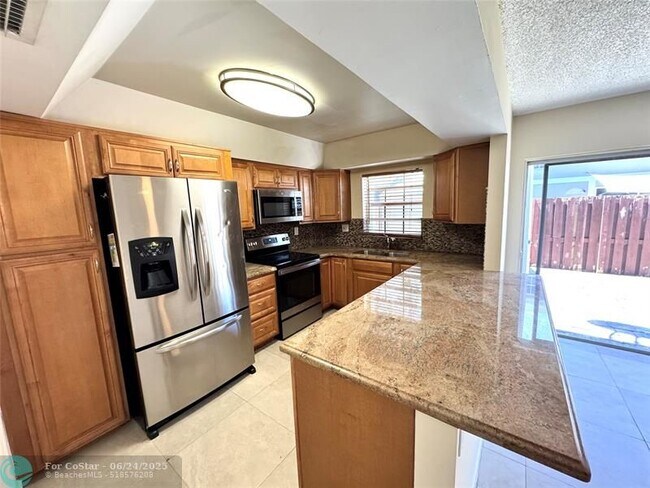 Building Photo - 12159 SW 52nd Ct