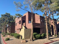 Building Photo - Top Floor Corner Condo with Balcony.