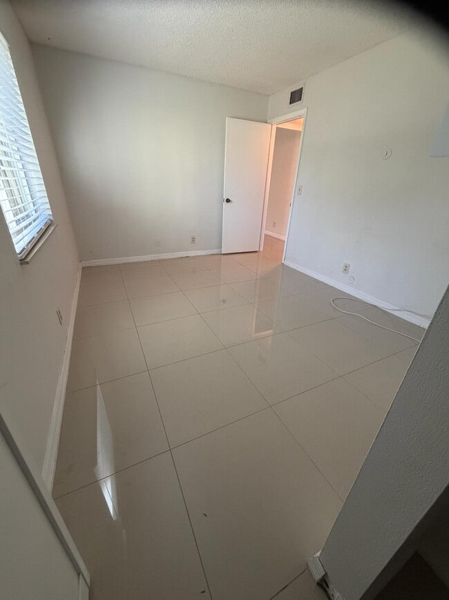 Building Photo - 5930 Whispering Pine Way