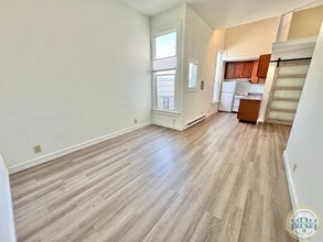 Building Photo - Top Floor Studio Unit in the Heart of the ...