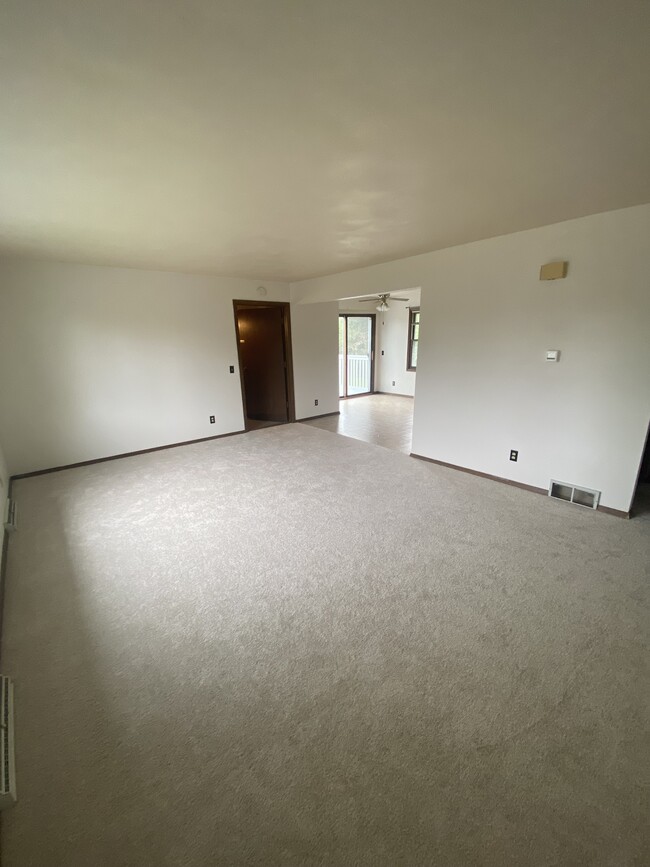 Living room, facing main door and kitchen - 2912 12th St S