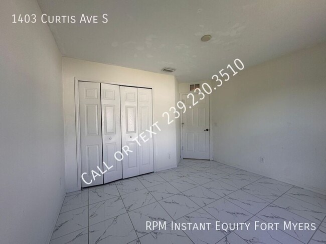 Building Photo - 1403 Curtis Ave S