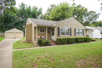 Building Photo - Gorgeous duplex unit on large lot with garage -- NO PETS ALLOWED