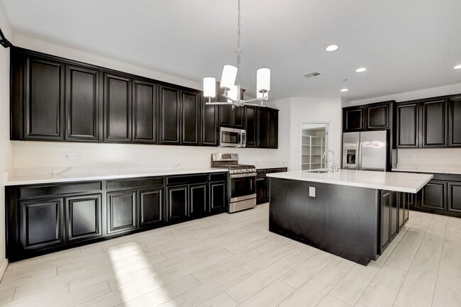 Building Photo - 4 Bedroom Townhouse in Tule Springs Coming Soon!