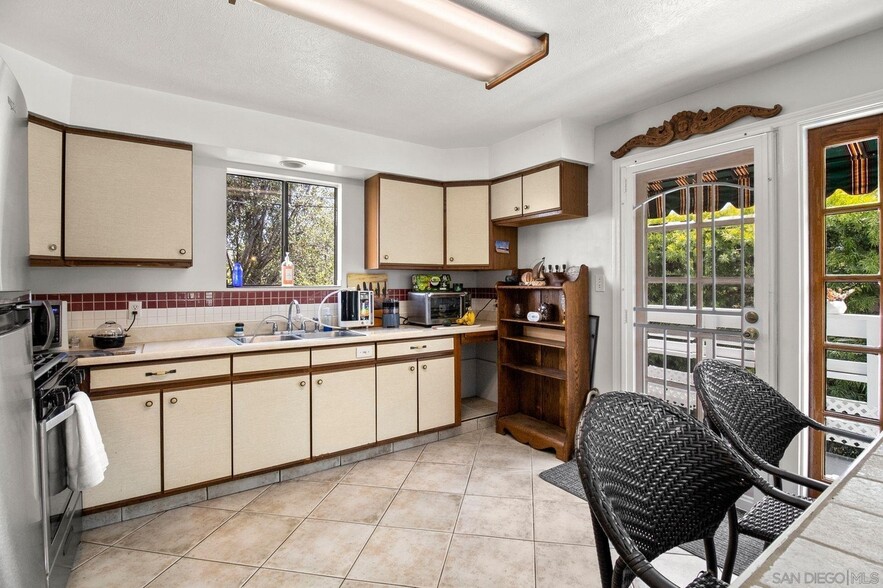 Kitchen to Balcony - Old Photo - 3616 E 10th St