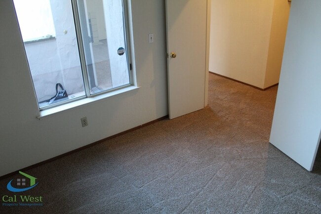 Building Photo - $2,695 - Upstairs 2 Bedroom/1 Bath Condo