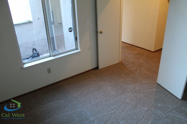 Building Photo - $2,895 - Upstairs 2 Bedroom/1 Bath Condo