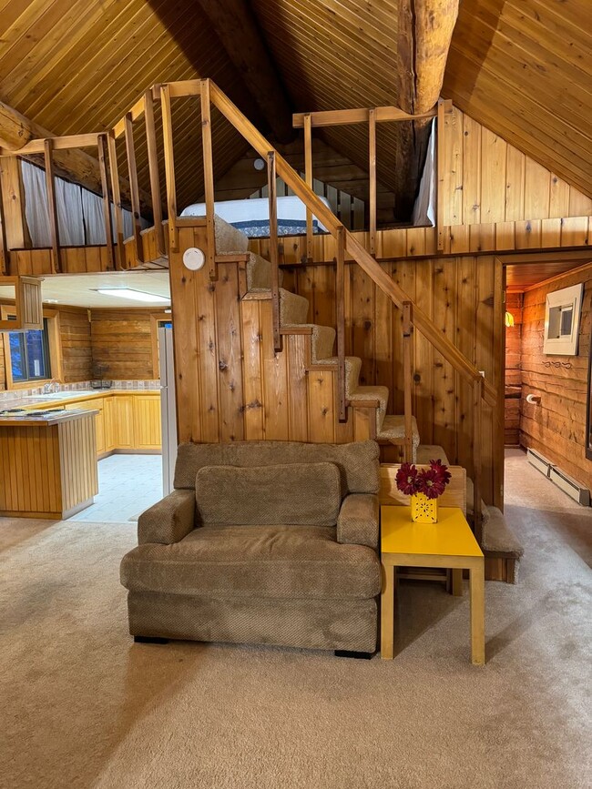 Building Photo - Century 21 Gold Rush - 1 loft bedroom  w/1...