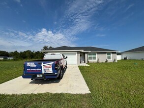 Building Photo - 2025 Newer House 3/2/2 fenced backyard. No carpet