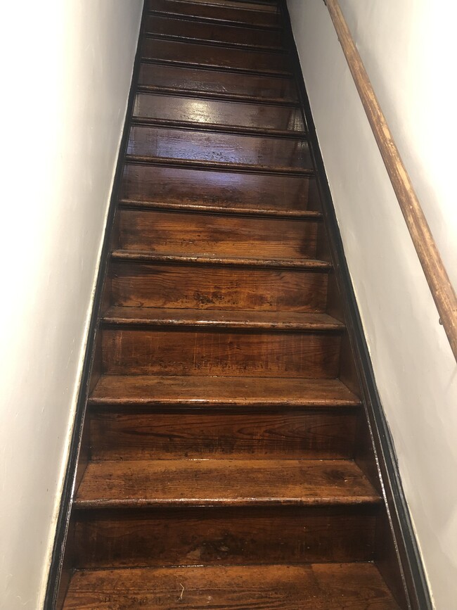 Front Staircase original historic hardwood - 4034 Arsenal St