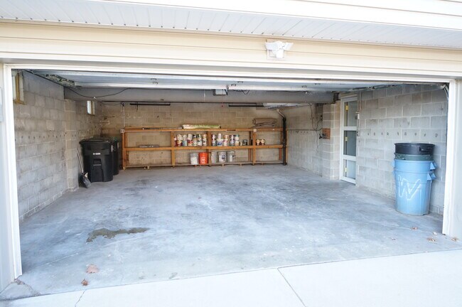 Winter no fear! Oversized 2-car attached garage, 2 openers and keyless entry - 12821 Westwood Ln