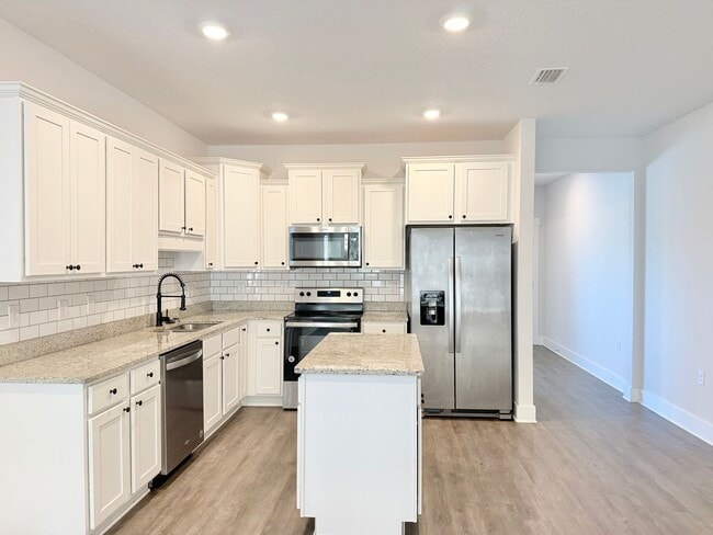 Building Photo - Spacious 3-Bedroom Home - Community Pool