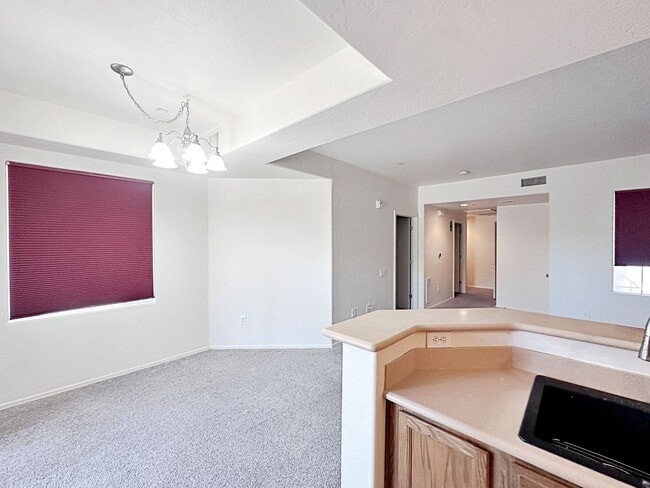 Building Photo - 1 BEDROOM DOWNSTAIRS CONDO IN GATED COMMUNITY 1 CAR GARAGE