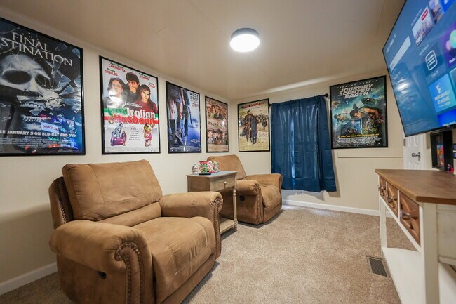 Building Photo - Cozy Fully Furnished 2-Bed with a Movie Ro...