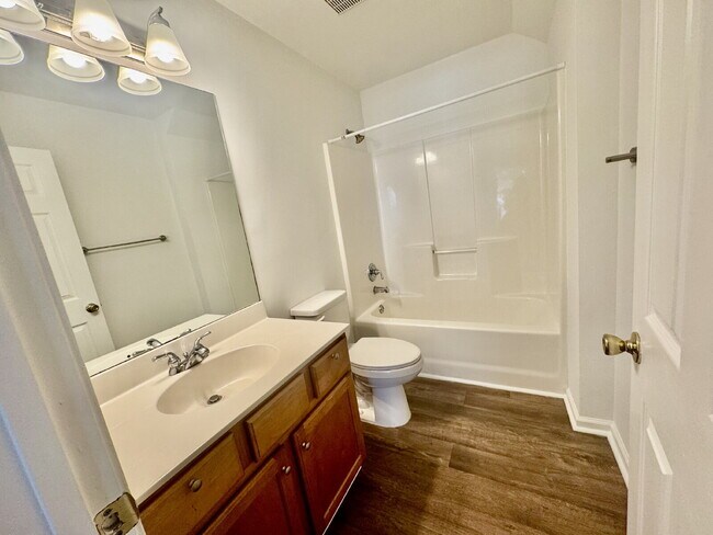 Building Photo - Four Bedroom, End Unit Townhome in the Farm!