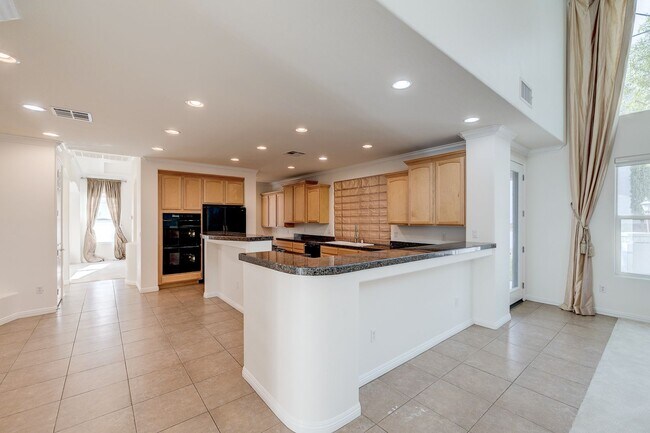 Building Photo - Beautiful 4Bd, 4Bth home in Guard Gated Community near Tivoli Village.