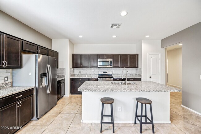 Building Photo - 31027 W Mulberry Dr
