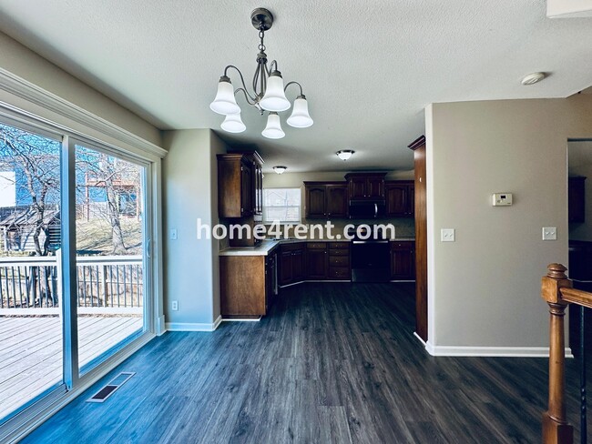 Building Photo - Spacious Four Bedroom Northland Home with a Finished Basement, 3 car garage and Fenced Yard!