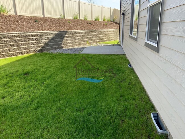 Building Photo - Woodbridge South Home with 4 Bedrooms and 3 Bathrooms in Post Falls build in 2021!