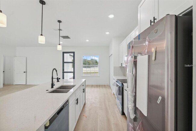 Building Photo - 6175 SW 144th Street Rd