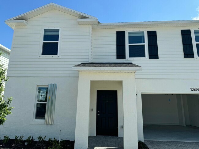 Building Photo - 10856 NW Everbreeze Dr