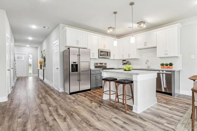 Building Photo - Be the first to live in this beautifully crafted 3-bedroom, 2.5-bath duplex—newly built and never...