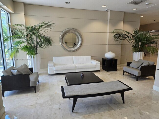 Building Photo - 19380 Collins Ave